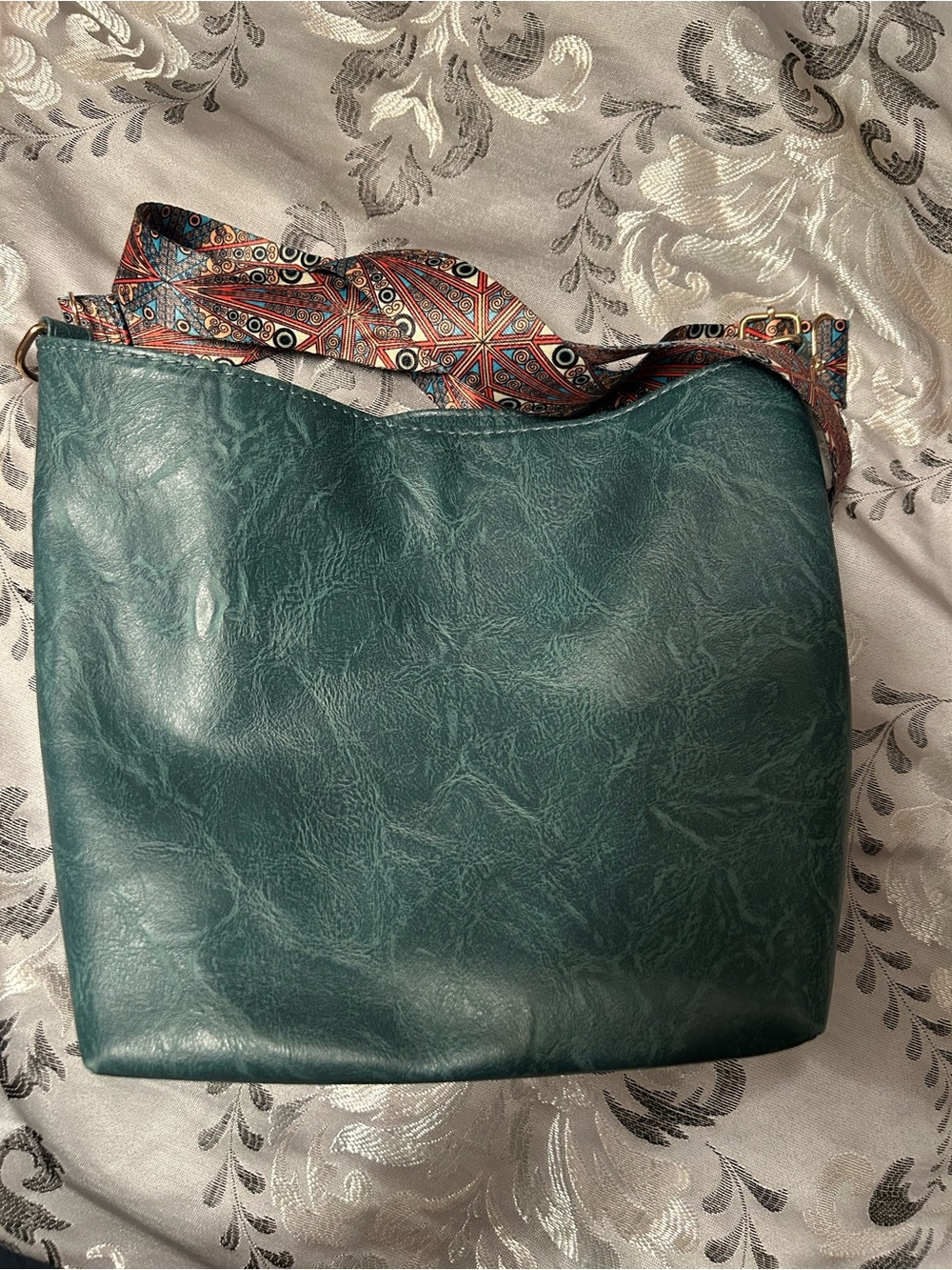 Classic Teal Crossbody Bag with Patterned Strap